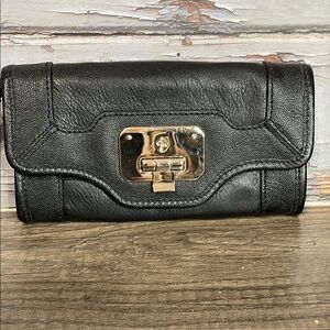 Cole Haan Black Leather Valise wristlet.
